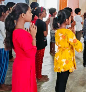Children doing prayer